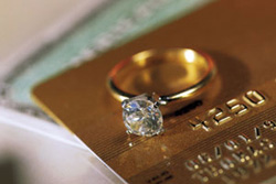 Photo of valuables: two credit cards and a diamond ring