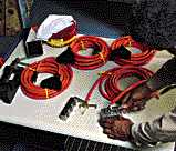 Man laying out cables