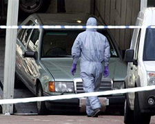 The car in which the suspected bomb was found being loaded today onto a removal vehicle. Photo courtesy AP.