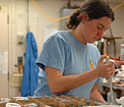 Photo of Susan Alford in a lab.