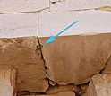 Close up photo of blocks with an arrow pointing to a cavity.