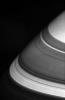 The dark shadows that drape Saturn's northern latitudes are split by three 
familiar bright gaps