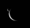 Two slim crescents smile toward the Cassini spacecraft following an occultation event