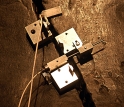 The MicroStrain Nano-DVRT wireless sensors clamped to the Liberty Bell.