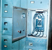 Three phase electrical disconnects. Can you find the grounding conductors?