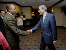 Secretary Gitierrez greets NALEO Official at the conference in Washington, D.C.