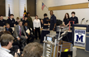 Secretary Carlos Gutierrez and NIST Director Dr. William Jeffrey along with Magruder H. S. staff are briefed on science and technology project