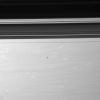 Epimetheus floats above Saturn's swirling skies