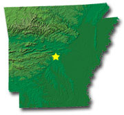 Image of Arkansas with a star pinpointing the location of the capital.