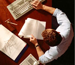 Photo: Man at desk