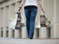 Photo of woman holding shopping bags.