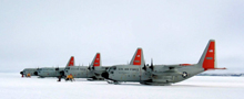 Ski-equipped hercules airplanes