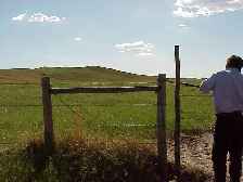 Closing the gate on 43 North 101 West, South Dakota.