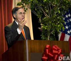 Dr. Stephen Sroka, keynote speaker at the DEA Red Ribbon Rally energizes the audience with his energy talk about the "Power of One."