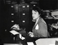 Clara Camille Carroll performs clerical work in 1943.