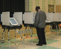 A man voting.