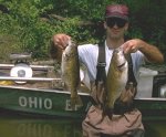 Man holds up fish