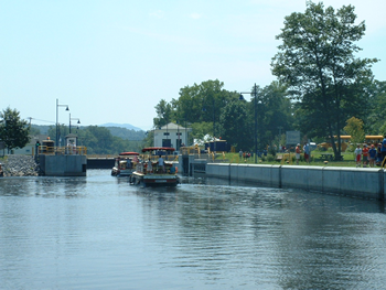 Boaters traveling through a lock in the Upper Hudson River