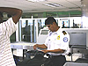 A supervisory transportation security officer from Newark works at the checkpoint to Concourse C at Louis Armstrong New Orleans International Airport.