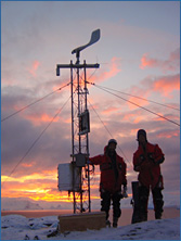 two scientists man a weatherstation