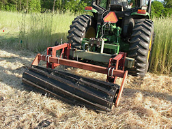 Agricultural engineer and his colleagues compared three different roller designs. This roller has curved bars: Click here for full photo caption.