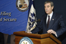 Secretary Carlos Gutierrez at podium