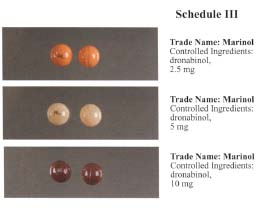 Picture of various dosage sizes of Marinol.