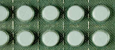 Photo of a blister pack of white tablets.