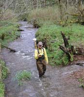 GPS surveyor in creek