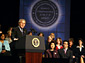 President Bush addresses the Women’s Entrepreneurship in the 21st Century Summit in Cleveland on Wednesday, as Secretary of Labor Elaine L. Chao (front row left) and Small Business Administration Administrator Hector V. Barreto (front row right) look on. 