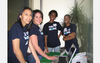 Students demonstating their computer games at an event.