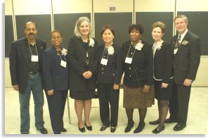Director Chun enjoyed a pre-conference moment with the keynote speaker, the conference partners and Women's Bureau staff.