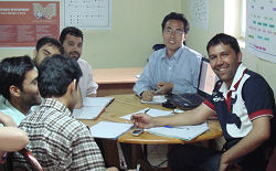 Chen Li shares his IT skills with local Afghans in Kabul.