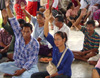 Residents of tsunami-affected villages in Thailand hold town hall meetings to discuss priorities for recovery efforts. 