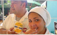Lácteos Palmares employees taste cheese at the Second Cheese Festival in Tegucigalpa, sponsored by Land O’Lakes - Click to read this story