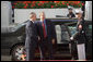 President George W. Bush welcomes British Prime Minister Tony Blair to the White House prior to their joint news conference Thursday evening May 25, 2006 in the East Room of the White House. White House photo by Eric Draper