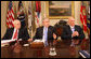 President George W. Bush, joined by Vice President Dick Cheney and U.S. Treasury Secretary Henry Paulson, right, addresses reporters Friday, Jan. 4, 2008 in the Roosevelt Room at the White House, following a meeting with the President's Working Group on Financial Markets. White House photo by Eric Draper