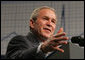 President George W. Bush addresses an audience Wednesday, Feb. 15, 2006 at Wendy's International, Inc. corporate headquarters in Dublin, Ohio, speaking on his commitment to help all Americans gain access to affordable, high-quality health care.  White House photo by Paul Morse