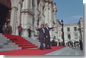 President George W. Bush and Peruvian president Alejandro Toledo (right) wave from the steps of the Presidential Palace in Lima, Peru, March 23, 2002. "It is an honor for me to be the first sitting President of the United States to visit Peru," said President Bush during the two leaders' joint press conference where he explained that steps such as reintroducing the Peace Corps to Peru are being taken to strengthen the relationship between America and Peru.