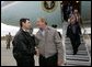 President George W. Bush meets USA Freedom Corps Greeter Jeff Kemp at Outagamie County Regional Airport in Appleton, Wisconsin, Friday, Oct. 15, 2004. For the past 12 years, Jeff has volunteered in the Oshkosh and Omro school districts. Once per week, he visits elementary school classrooms and reads to students. White House Photo by Eric Draper. 