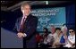 President George W. Bush addresses seniors on pending Medicare legislation at the Little Havana Activities and Nutrition Center in Miami, Fla., June 30, 2003.  White House photo by Paul Morse