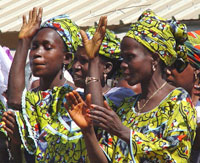 Photo of dancers celebrating after the pledge to end FGC in 150 villages in the Fouta Djalon region of Guinea.