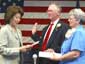 Secretary Chao swears in W. Roy Grizzard as Assistant Secretary for ODEP, 