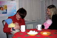 Photo of mothers discussing baby care in a Maternity Hospital in Symferopol (click here to read more).