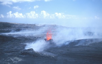 Spatter cone erupting near Pu`u `O`o, Kilauea Volcano, Hawai`i
