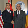 USAID Administrator Natsios (r.) congratulates Earl Gast (l.), the newly-installed Mission Director for the USAID Regional Mission in Ukraine