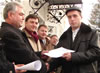 Edinet Mayor Leonid Jidacevschii hands the first trade license issued by One Stop Shop On-line to Alexandru Mişcenc