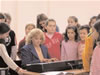 Students of Sveti Sava elementary school in Mitrovica and their music teacher at the dedication ceremony