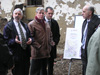 USAID Mission Director Michael Farbman (far left) and KCBS project’s Martin Wood and Valdet Osmani (middle) talk with workers and residents about the clean-up at a site behind an apartment building, where garbage was piled six feet high. Vushtrri/Vucitrn Mayor Bajram Bulalu (far right) listens.