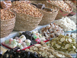 Baskets of nuts and sweets made from fruits line the walls of the Hasarat Sweet Shop, a local fixture for 30 years.